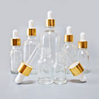 Hot Selling 10ml 30ml 50ml Glass Essential Oil Bottle with Golden Pipette Dropper
