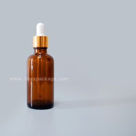 50ml clear glass essential oil bottle with pipette dropper and a white band and a white top