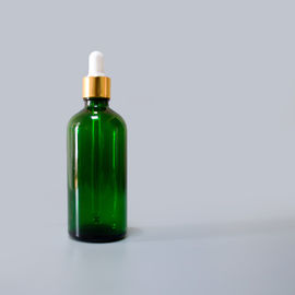 100ml clear green color glass essential oil bottle with insert and tamper proof cap for essential oil